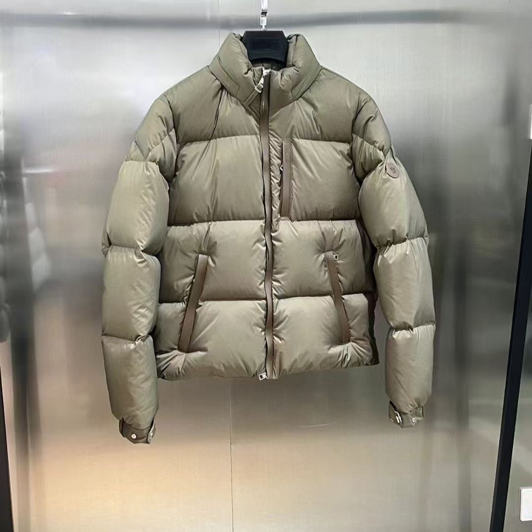 Moncler Stand-up collar, thick down jacket with duck down insulation.
